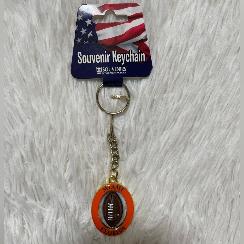 NEW PCF Souvenirs Miami Florida Spinning Football Keychain Orange Blue Dolphins
